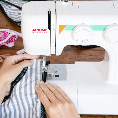 Janome MOD-15 Easy-to-Use Sewing Machine with 15 Stitches